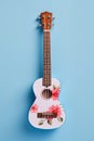 small pastel colored ukulele, generated ai illustration Royalty Free Stock Photo