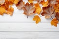 Generative AI Image of Autumn Background with Maple Leaves on a White Wooden Table Royalty Free Stock Photo