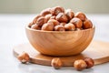 Generative AI Image of Brown Hazelnuts in a Wooden Bowl