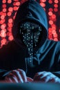 Computer hacker with hoodie working on dark web, ready to steal your data. Cybersecurity concept.
