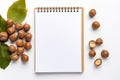 Generative AI Image of Top View of Blank Note Paper with Hazelnuts on White Background