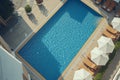 Generative AI Image of Top View of Outdoor Swimming Pool with Leisure Chairs in Hotel