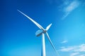 Generative AI Image of White Windmill Wind Turbine in Blue Sky Royalty Free Stock Photo