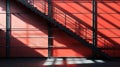 Generative AI Industrial building interior with red wall and black, metal staircase business concept. Royalty Free Stock Photo