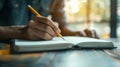 Generative AI Man Holding Pencil over Blank Page of a Notebook business concept.