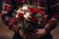 Generative AI man in a red checked shirt holds a bouquet of white and red roses. The guy was going on a date. A surprise