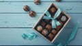 Generative AI Open box of delicious chocolate candies and color ribbon on light blue wooden table flat lay busines