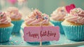 Generative AI Pink and blue birthday cupcakes with happy birthday sign and confetti business concept. Royalty Free Stock Photo