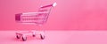 Generative AI, pink shopping cart on pink background, minimalistic shop online, free delivery, discounts