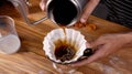 Generative AI Professional barista making filtered drip coffee in coffee shop Close up of hands barista brewing a