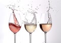 Generative AI Red, white and rose wine glasses and one champagne glass dancing and plash on white background busin