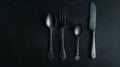 Generative AI Rustic vintage set of cutlery knife, spoon, fork. Black background. Top view business concept. Royalty Free Stock Photo