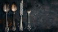 Generative AI Rustic vintage set of cutlery knife, spoon, fork. Black background. Top view business concept. Royalty Free Stock Photo