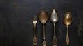 Generative AI Rustic vintage set of cutlery knife, spoon, fork. Black background. Top view business concept. Royalty Free Stock Photo