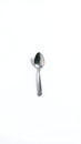 Generative AI a single polished spoon on a stark white background Royalty Free Stock Photo