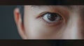 Generative AI slow motion of male eye close up from asian young man half face business concept.