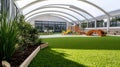 Generative AI Sunlit Indoor Playground with Grass and Modern Play Structures business concept.