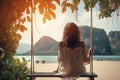 Traveler woman relaxing on swing above Andaman 3 Royalty Free Stock Photo