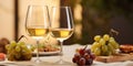 Two wineglasses of vintage chardonnay with delicious appetizers 2