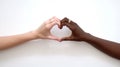 Generative AI Two young darkskinned people holding hands in shape of heart symbolizing love peace and unity Africa