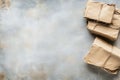 Generative AI Vintage Styled Brown Paper Packages Wrapped in String on Rustic Textured Surface business concept. Royalty Free Stock Photo