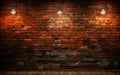 Vintage textured red brick wall with spotlight shining in the center, ideal for backgrounds or as a grunge design element Royalty Free Stock Photo