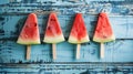 Generative AI Watermelon slice popsicles on a blue rustic wood background business concept. Royalty Free Stock Photo