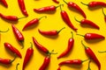 Generative AI Word hot made of red spicy Mexican chili pepper of long shape isolated over yellow background Chili