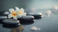 Generative AI Zen spa concept background - Zen massage stones with frangipani plumeria flower in water reflection Royalty Free Stock Photo