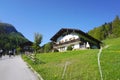 Generic bavarian house with green lawn