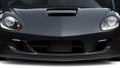 Generic black sports car (with grunge overlay), headlights detail - 3d illustration