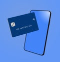 A generic blue credit card is seen with a modern sleek mobile phone