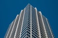 Generic corporate office building with blue sky