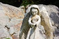 Cradling Angel Garden Ornament Cement Sculpture Royalty Free Stock Photo