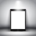 Generic electronic tablet on spotlit background