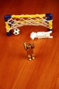 Generic figures recreating a goalkeeper letting in a goal in soccer