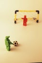Generic figures recreating a penalty shootout in soccer Royalty Free Stock Photo