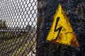 Generic High Voltage Danger Sign,symbol. Black arrow isolated in yellow triangle. Warning icon.