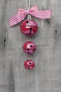 Generic machine made Christmas bells ornament on rustic style ba Royalty Free Stock Photo