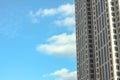 Generic office building set against blue sky