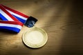 Generic sporting event gold medal with red and blue ribbon Royalty Free Stock Photo