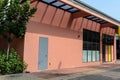 A generic store building with glass awning.