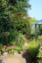 Generic view down garden path on sunny July day Royalty Free Stock Photo