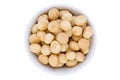 Bowl of fresh healthy shelled macadamia nuts Royalty Free Stock Photo