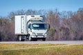 Generic White Refrigerated Delivery Truck On Roadway Royalty Free Stock Photo