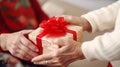 Generous Hands Offering a Gift Wrapped with Love. Generative ai Royalty Free Stock Photo