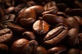 A generous pile of rich, dark roasted coffee beans, perfect for brewing a flavorful cup of coffee that will invigorate your senses Royalty Free Stock Photo