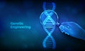 Genetic engineering concept with magnifier in hand and DNA sequence. Wireframe DNA molecules structure mesh. DNA code