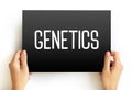Genetics is a branch of biology concerned with the study of genes, genetic variation, and heredity in organisms, text concept on Royalty Free Stock Photo