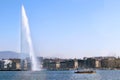 Geneva lakefront Water jet cityscape cruise ship buildings